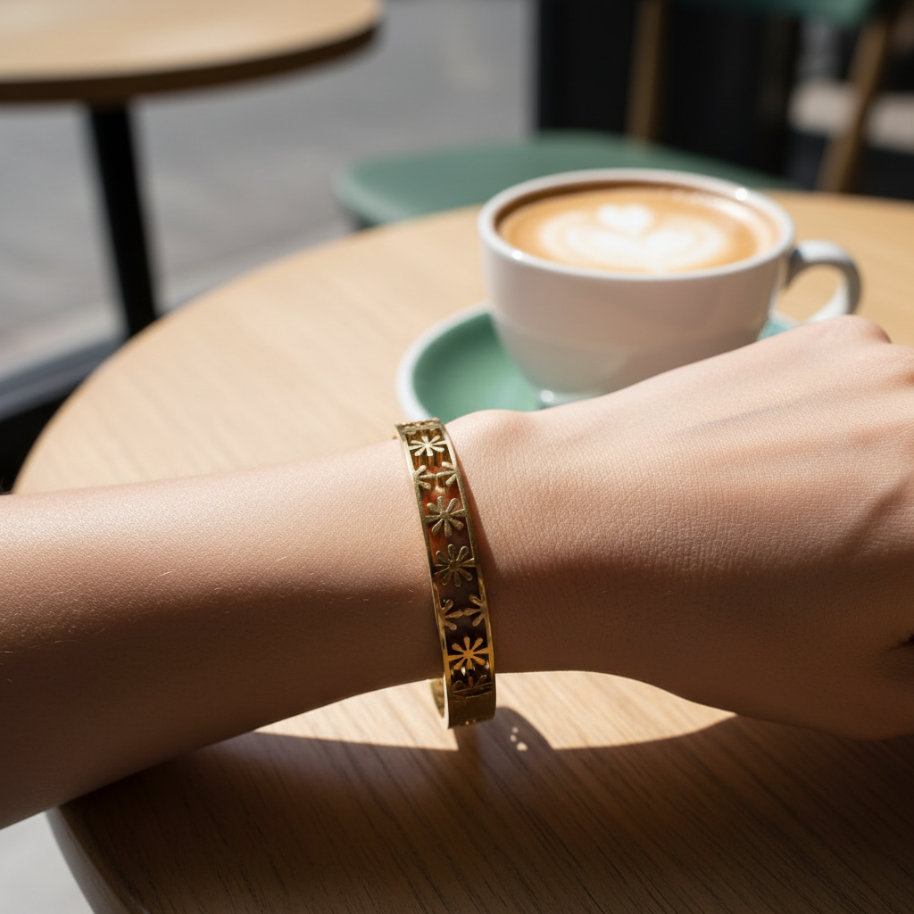 Hollow Flower Bangle - photorealistic cafe lifestyle shot