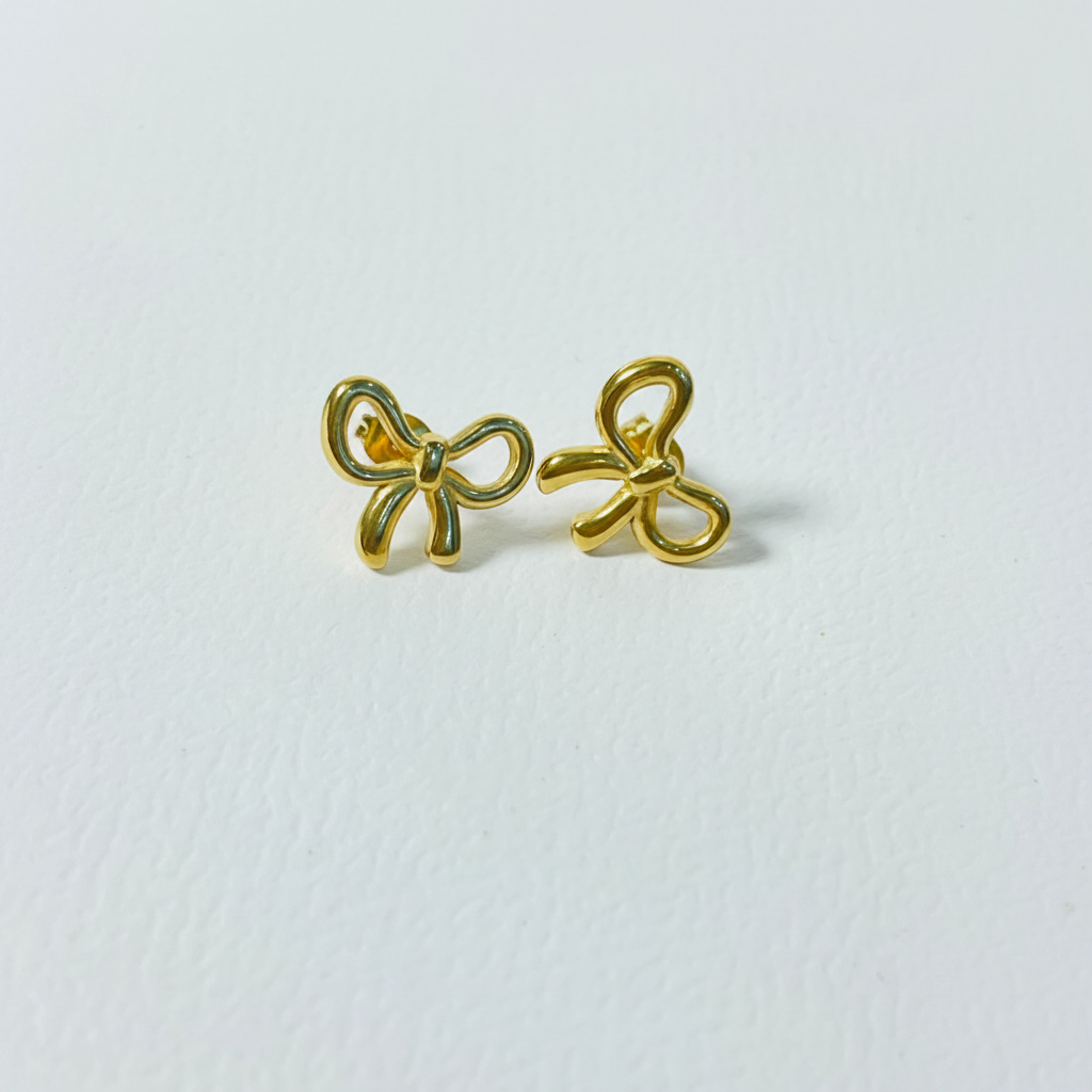Gold Bow Studs - White Background Studio Shot