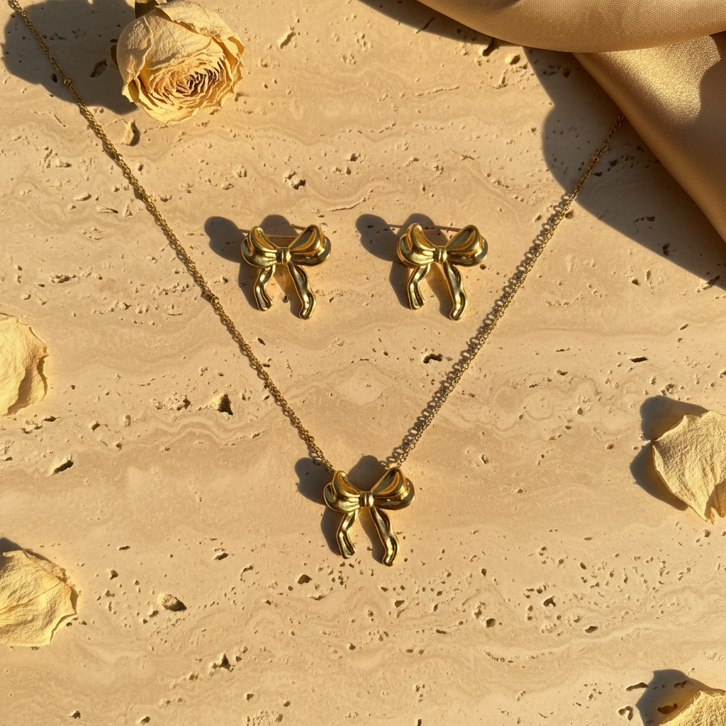 Golden Bow Jewellery Set - Flat Lay